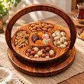 Foldable wooden dry fruit tray filled with nuts and dried fruit