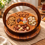 Foldable wooden dry fruit tray filled with nuts and dried fruit