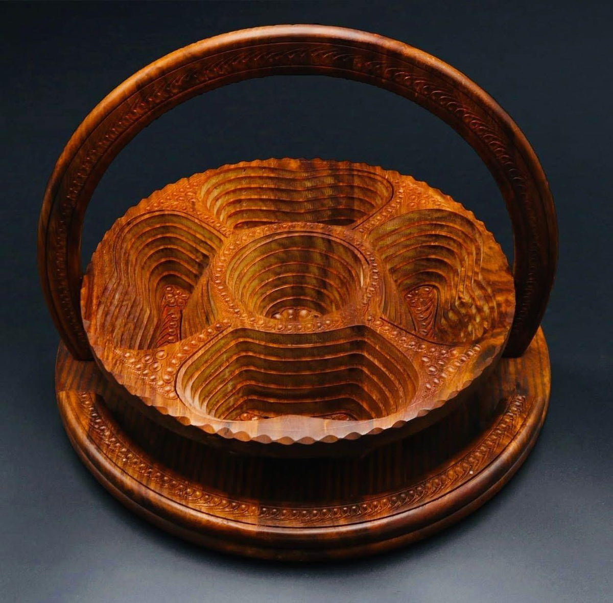 Open wooden serving basket with four divided snack compartments