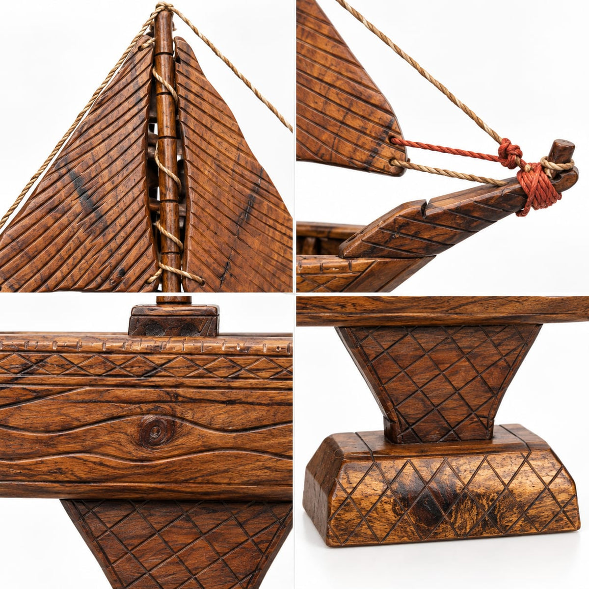 Handcrafted wooden sailing boat with detailed sails