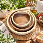 Wooden serving bowls that fit inside each other