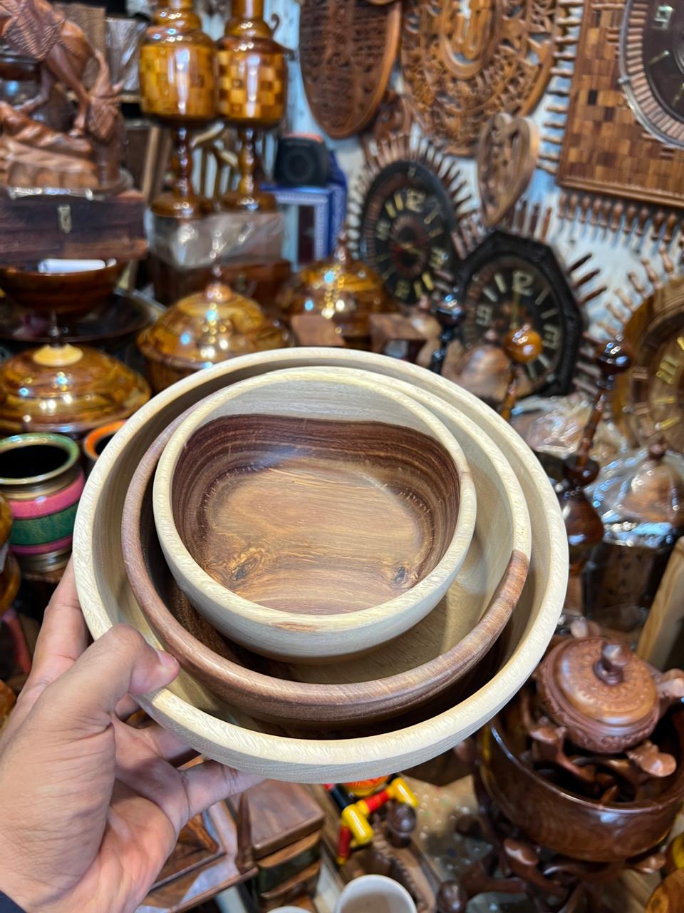 3-piece wooden serving bowl set with rustic wood grain